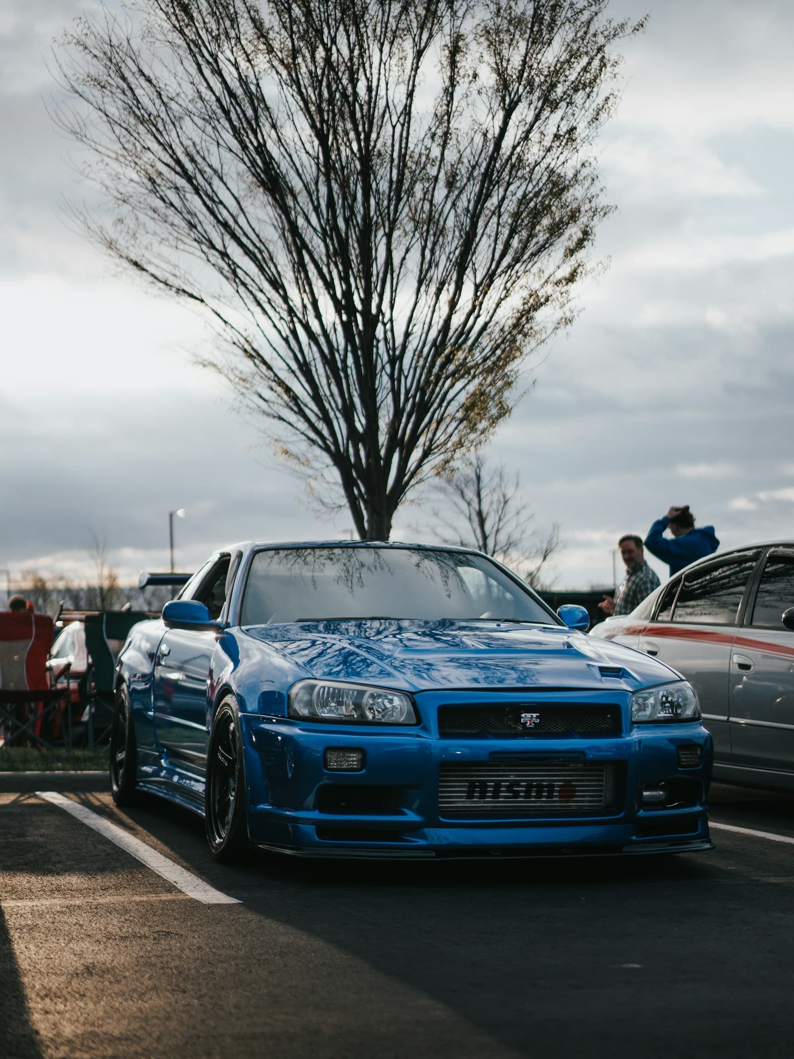 Stock blue Nissan Skyline R34, before JDM render