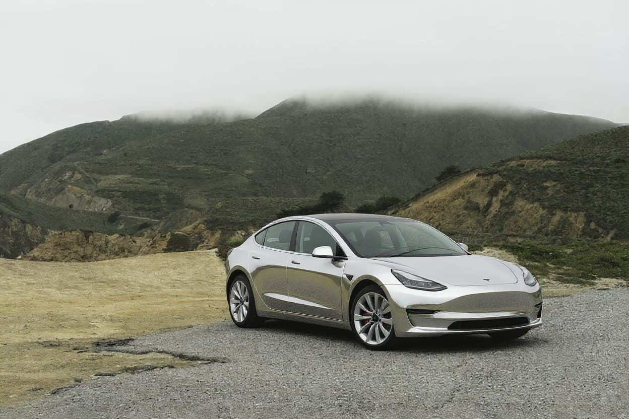 Tesla Model 3 in Mirror Chrome, AI wrap render | TunedRides
